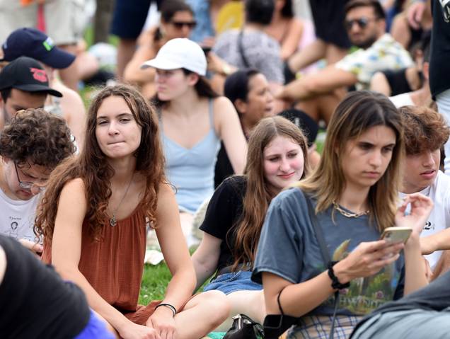 A picture containing person, outdoor, people, group
Description automatically generated